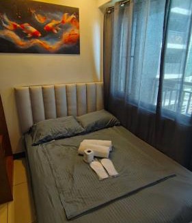 Legazpi Village Apartment | J and J RED Residence