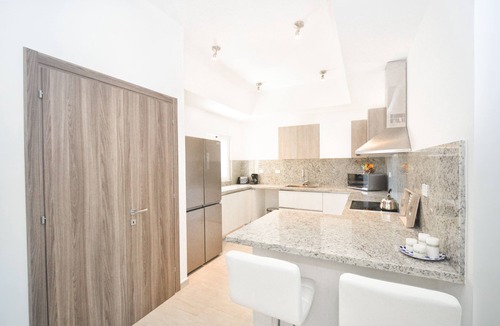 Bavaro Condo | Luxurious Condo on Cana Bay Golf Course w/private Beach Club next to Hard Rock