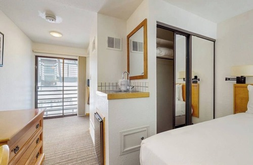 West End Cabin | Main Street studio - pool & hot tub - walk to lifts, dog-friendly, second floor