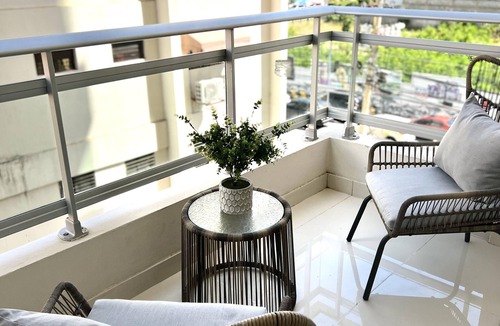 Yolanda Morales Condo | Modern King Size Bed Condo with Pool by Agora Mall
