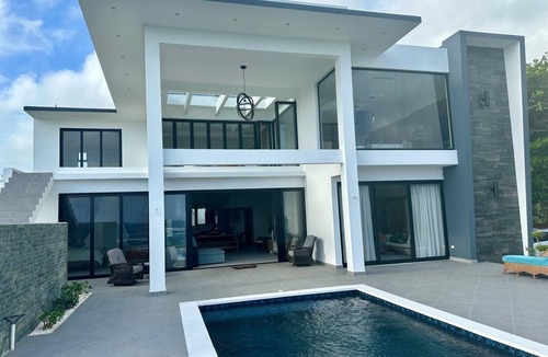 Cabrera House | Modern Oceanfront 4-bedroom house with pool, WiFi, AC in lovely town of Cabrera