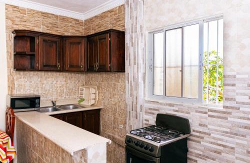 Corales del Sur Apartment | Modern Studio Near Airport Fast WiFi Generator