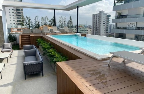 Evaristo Morales Condo | New-Pool-Comfy-CityCenter-WiFi-AC-Safe-YellowKey