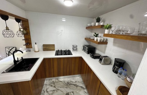 Ciudad Universitaria Apartment | Ocean View 3BR Sleeps 6 2 Baths Malecon AC WiFi