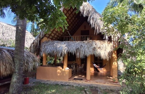 Las Galeras House | Palm-roofed house in the second row to the sea