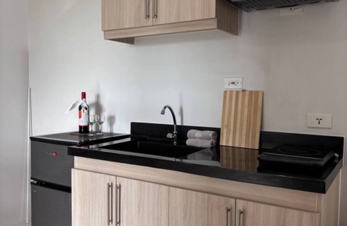 Dauis Condo | Peaceful 1-bedroom condo with access to pool, gym, and playground in Bohol