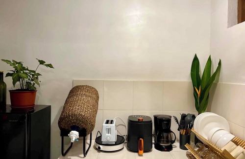 Catangnan Apartment | Private Boutique Studio in Central General Luna with Starlink WiFi