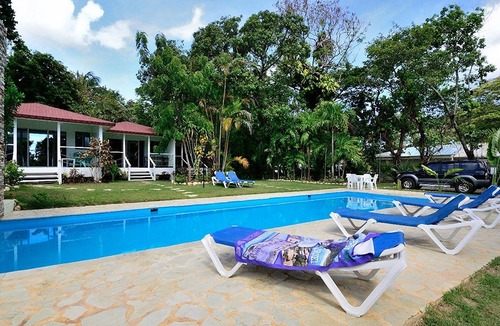 Urbanizacion Tavarez House | Private bungalow in large tropical garden with pool, steps from shops/beaches!