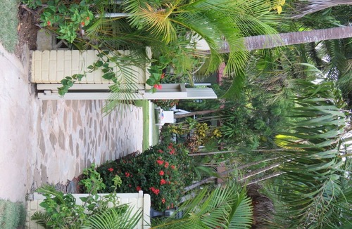 Urbanizacion Tavarez House | Private bungalow in large tropical garden with pool, steps from shops/beaches!