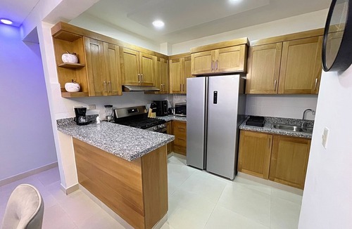 Centro Historico de Santiago Apartment | Spacious 3-bedroom Apt. w/Pool, Gym, private patio and BBQ in Santiago