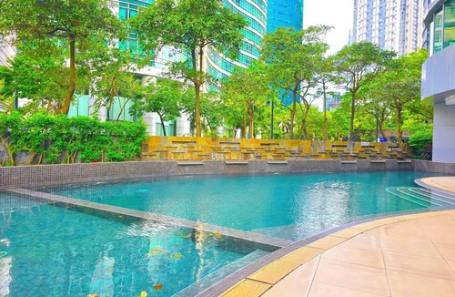 Forbes Park Condo | Spacious 2-bedroom condo unit with pool and gym access in tranquil Taguig BGC