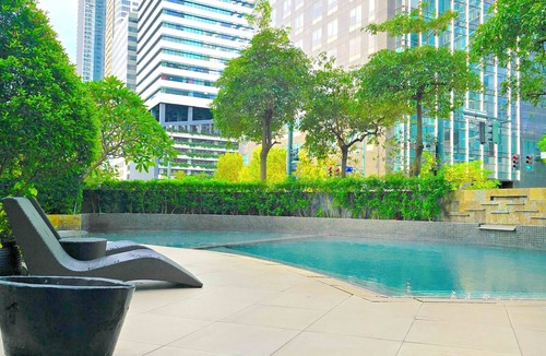 Forbes Park Condo | Spacious 2-bedroom condo unit with pool and gym access in tranquil Taguig BGC