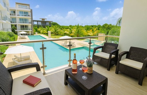 Bavaro Apartment | Spacious and Elegant 2BR Condo, King size Bed, Full AC, Pool, Steps to Hard Rock