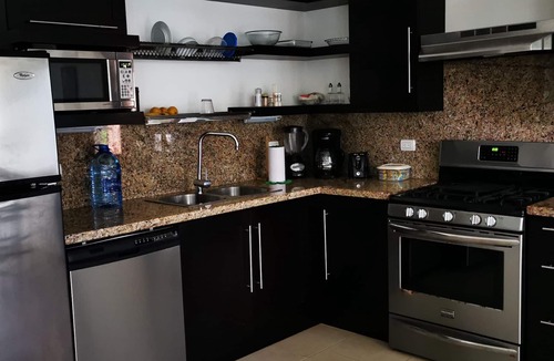 El Batey Apartment | Stylish 1BR Terrace Steps to Beach & Pools Free Weekly Maid Service