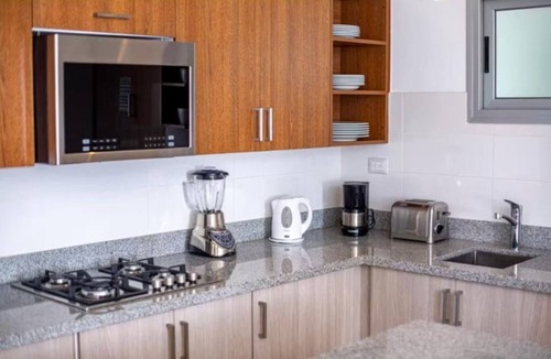 ProCab Condo | Superb 2-bedroom suite with kitchen, sea view