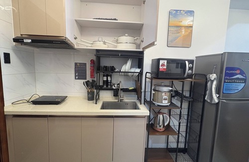 Paranaque Condo | Sybay suites beside okada manila near airport MOA COD and DFA cozy place to stay
