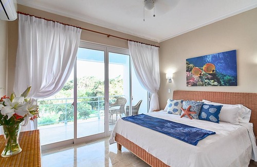 Sosua Apartment | Top-floor luxury beachfront penthouse, sea views, jacuzzi on terrace!