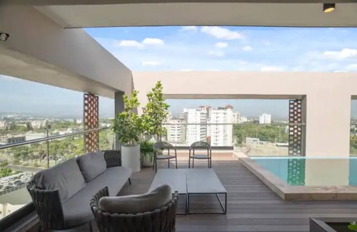 Gregorio Luperon Apartment | Tower Rialto | A Cozy Getaway