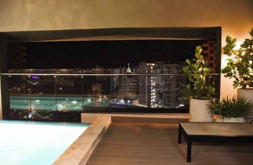 Gregorio Luperon Apartment | Tower Rialto | A Cozy Getaway