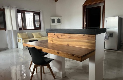 La Iglesia Apartment | Traditional 2BR Dominican Home with Private Balcony - 10 Min Walk to Beach