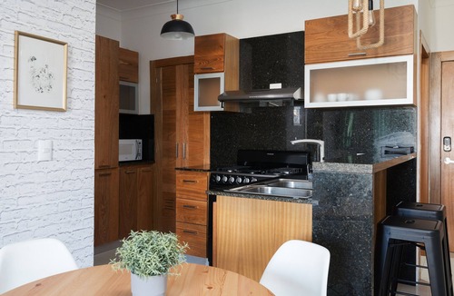 La Julia Apartment | Tranquil Heights: Your Cozy Urban Getaway with Pool, Gym, and Spa