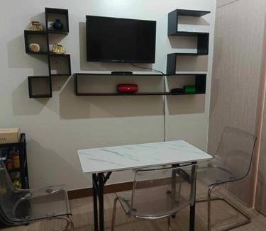 Novaliches Apartment | Trees Residences 1 Bedroom with Netflix and Bluetootth Karaoke Speaker with 2 mini Microphone