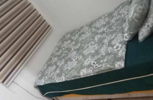 Novaliches Apartment | Trees Residences 1 Bedroom with Netflix and Bluetootth Karaoke Speaker with 2 mini Microphone