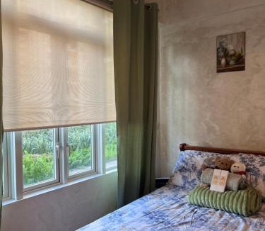 Pinagsama Apartment | Work Stay Suite with Garden Access near Venice Grand Canal and BGC