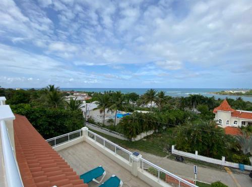 2 BR & 1WR Suite at Villa Costa Verde near Playa Cofresi, Puerto Plata with a pool, balcony, and a rooftop terrace