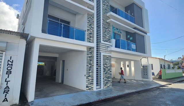 3 bd condo with rooftop across the street from beach!