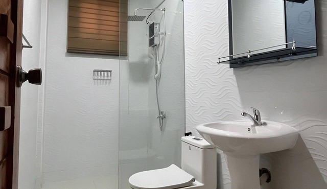 A temporary relocation, this space provides comfort, privacy, and convenience.