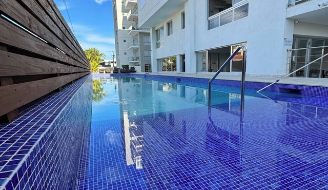 Apt+WiFi+Parking+Ac+Near The Beach+Tv @BocaChica 2 Min walk to the Beach