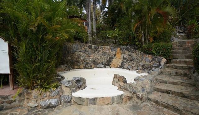 Beautiful villa surrounded by tropical gardens by breathtaking Playa Bonita