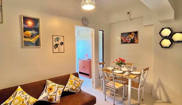 Brand new condo with free access to parking 5 minute walk to white sand beach