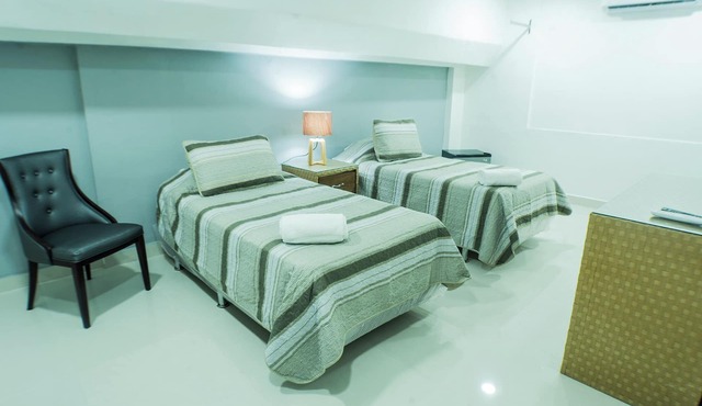 Cozy 1-bedroom hotel in serene Santo Domingo with AC downtown