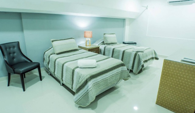 Cozy 1-bedroom hotel in serene Santo Domingo with AC downtown