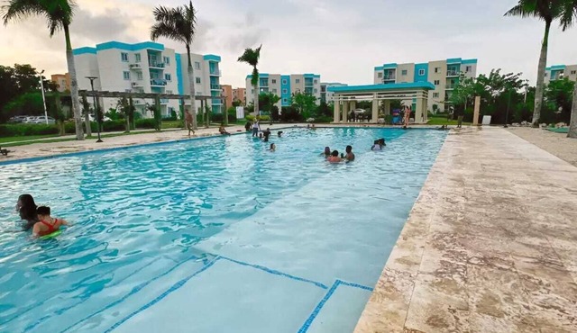Cozy 2BR Retreat w/Pool, WiFi, Parking – Minutes to Beach