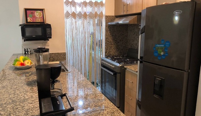 COZY AND GREAT Location at 1st Floor condo close to shopping center and beaches.