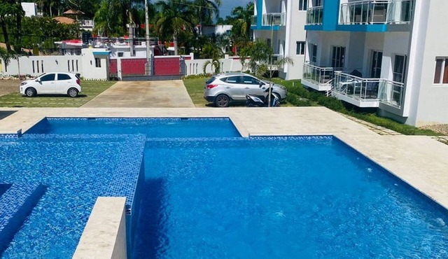 Elegant 2BR/2BA condo: unwind by the pool. Guest-friendly, near all