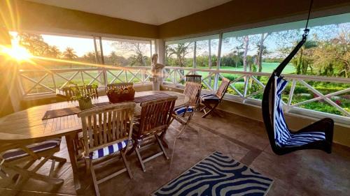 Elegant Golf Retreat with Jacuzzi Terrace - 3BR Apartment in Guavaberry Golf and Country Club - Gated Resort