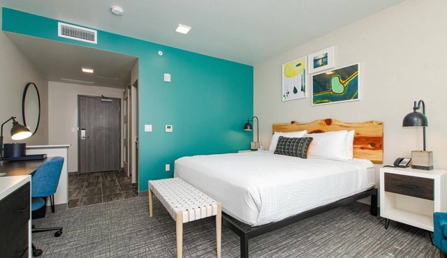 Enjoy Scenic Riverfront Stays at a Spacious Room with Locally Inspired Design in Independence