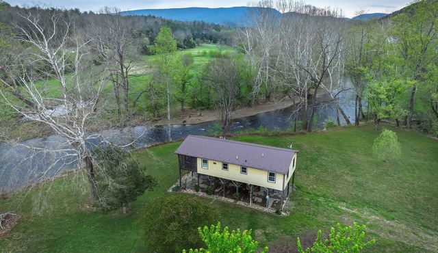 Fire Pit + Patio: Creekside Cabin in Eagle Rock! in Eagle Rock