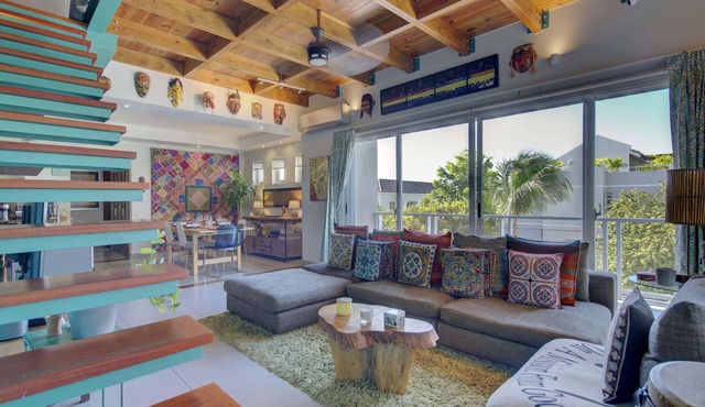 Host Dinner Parties at a Roomy Penthouse near Golf Courses