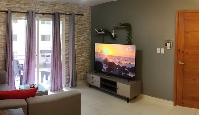 Located near Las Americas Airport, near supermarkets and restaurants.