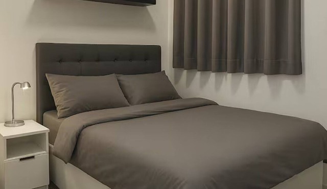 Lux 2BR Condo in Taguig with High-speed Internet, Disney, Washer and Pool