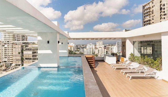 Modern King Size Bed Condo with Pool by Agora Mall