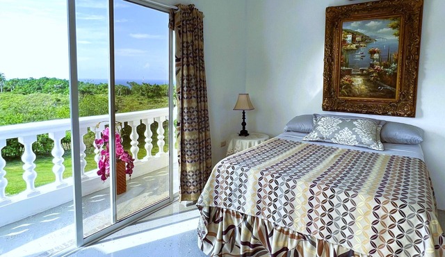 Mountain view suite with balcony, pool, sitting area, & more- close to beach!