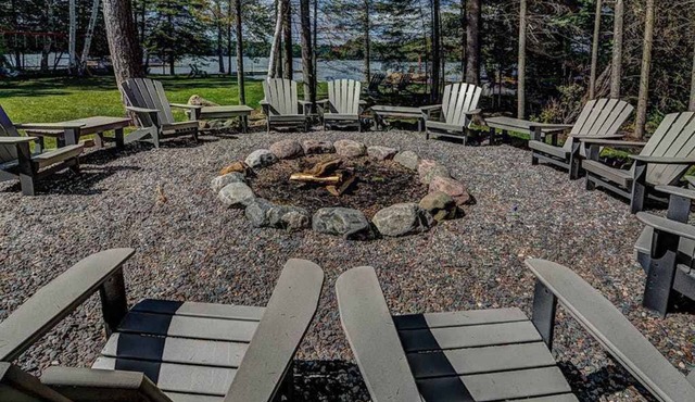 Plush lakefront lodge with private dock, high-speed WiFi, & game room in Eagle River