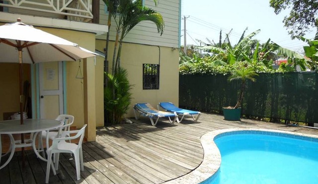 Private bedroom in guesthouse, steps from largest supermarket in Sosua