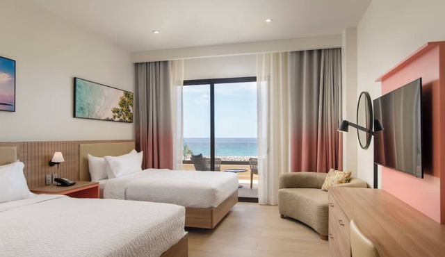 Relax in a Modern Room w/Pool Access, Stunning Ocean Views & Free Parking